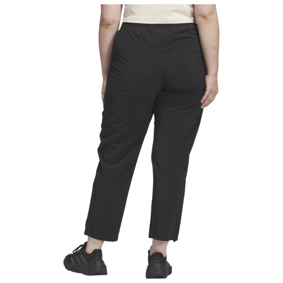 Adidas Γυναικείο παντελόνι φόρμας Training Pants (Plus Size) Adidas Γυναικείο παντελόνι φόρμας Training Pants (Plus Size)